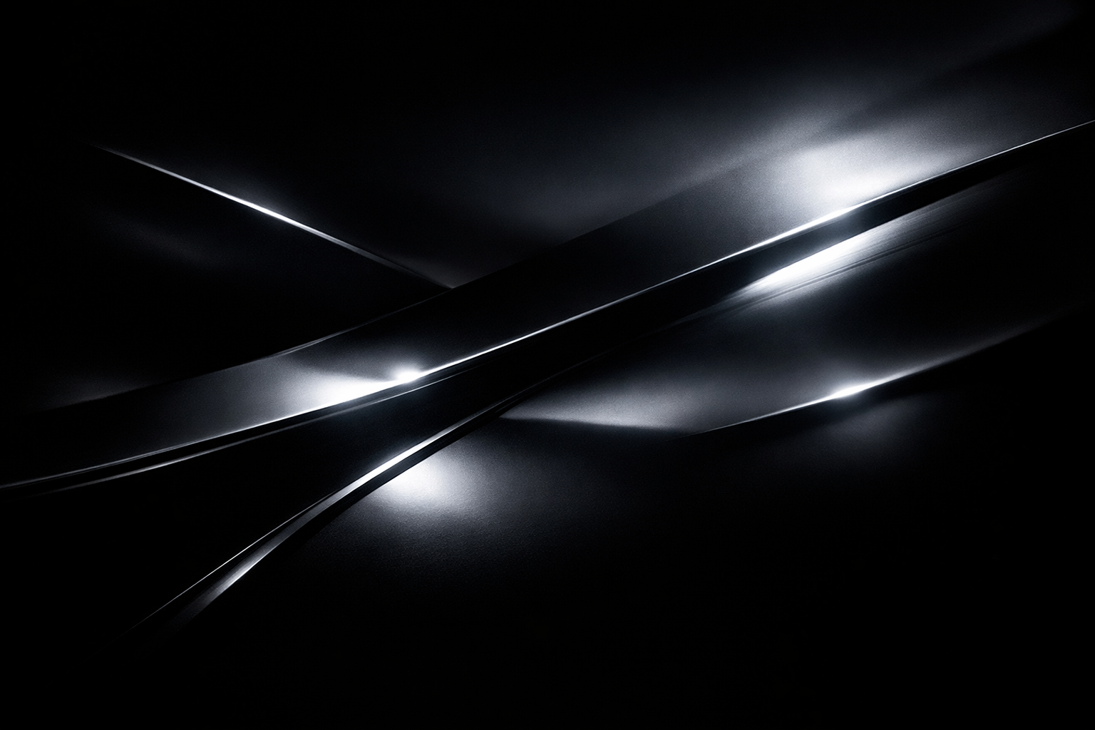 Abstract dark‑chrome shapes with sharp light beams cutting through darkness, symbolising movement, strength, clarity, and the moment VARELO™ found its purpose.