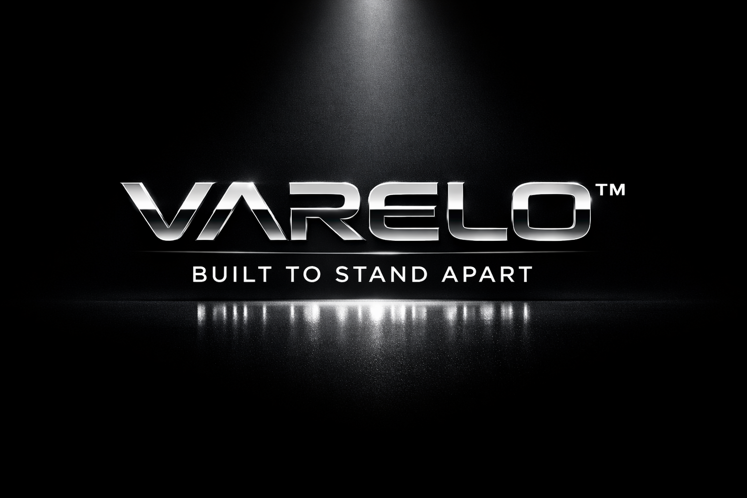 VARELO™ logo in metallic chrome with spotlight reflection and tagline “Built to Stand Apart” on a black background.
