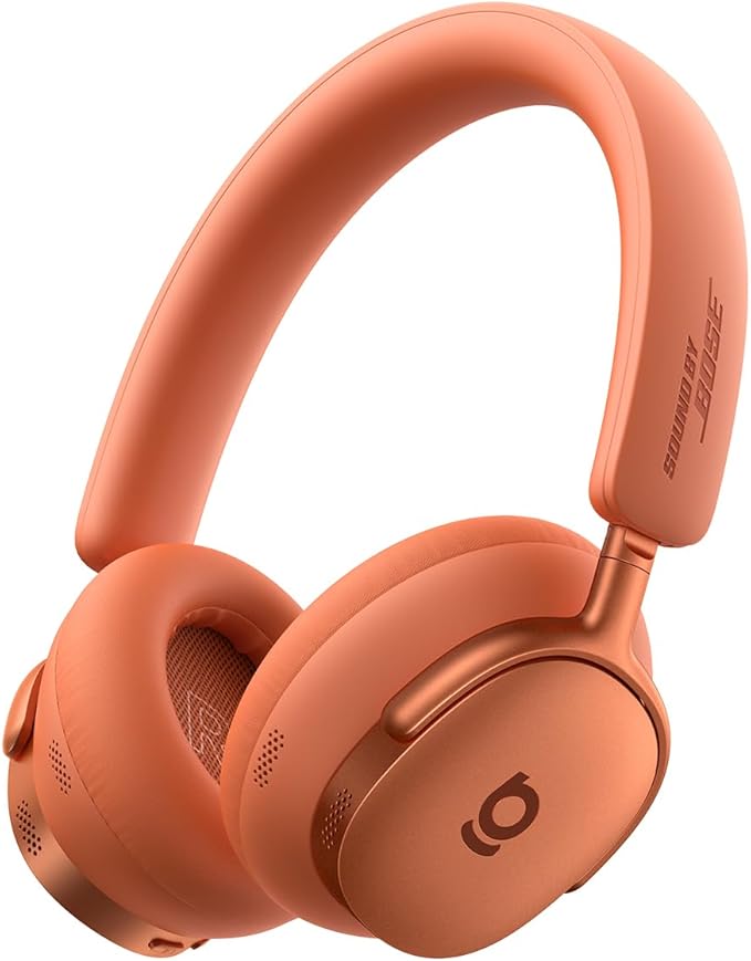 Baseus Inspire XH1 Wireless ANC Headphones in Sunset Coral featuring cushioned over-ear cups, a padded headband, and built-in controls on a plain white background.