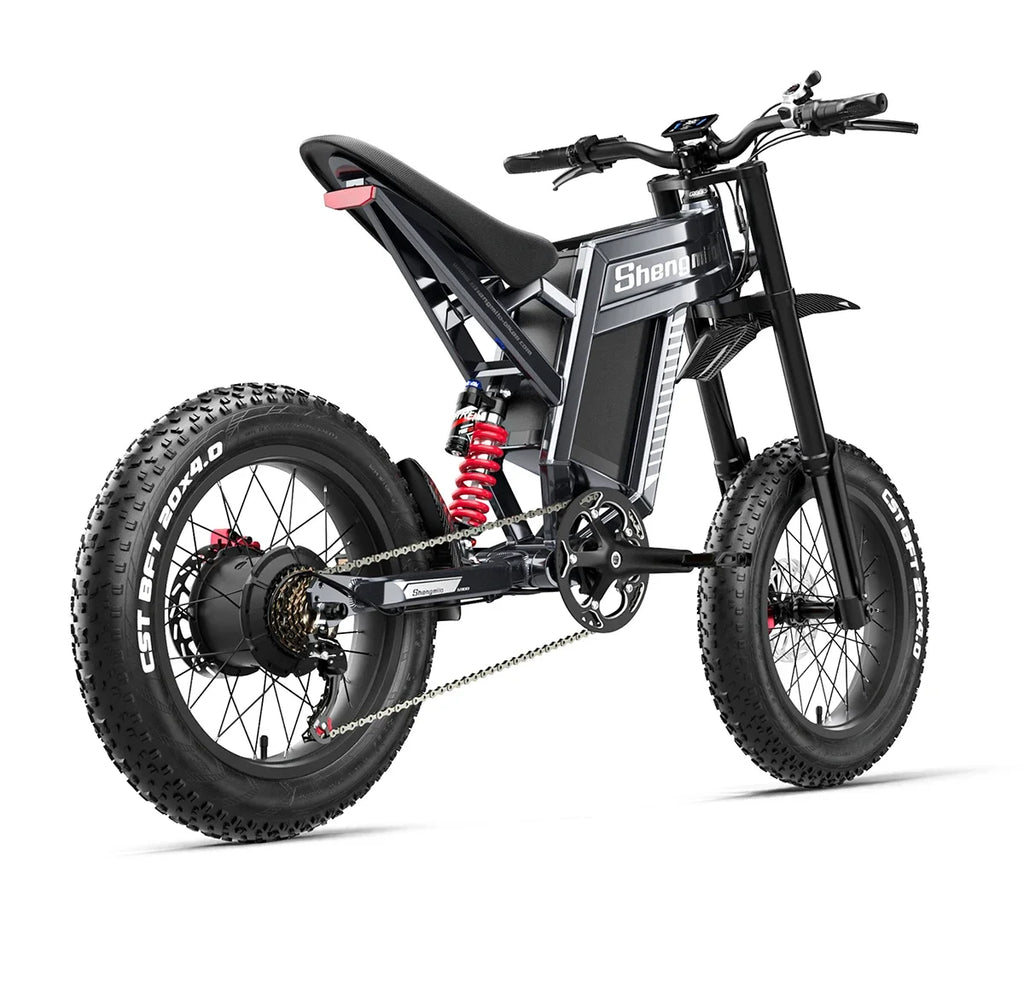 Black electric mountain bike with red suspension on a white background