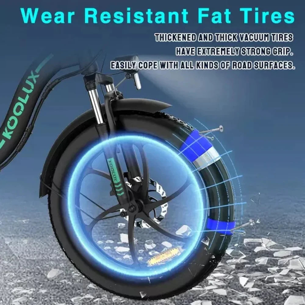  KOOLUX BK6S PRO e-bike with wear-resistant fat tires on a road surface, highlighting tire strength and grip.