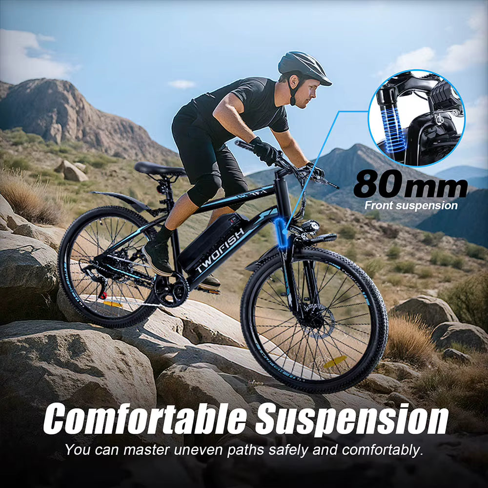 Person riding a TWOFISH TF-1 Electric Bike with 80mm front suspension on rocky terrain, highlighting the bike's features.