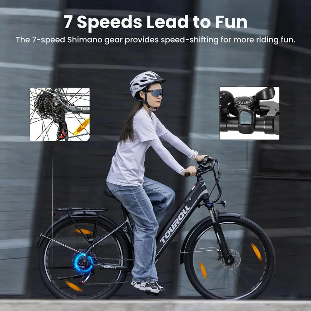 Woman riding an electric bicycle with 7-speed Shimano gear highlighted, against a dark background.