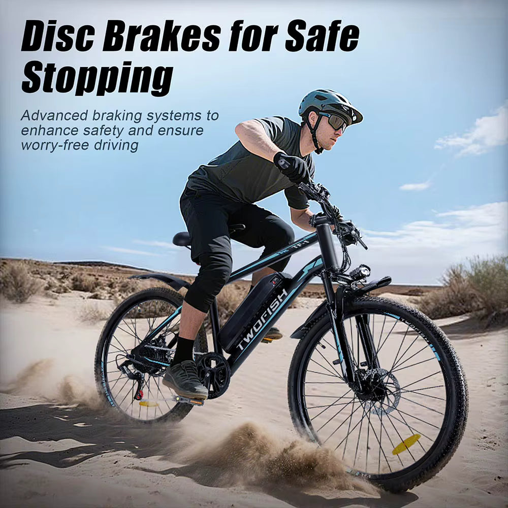 Person riding a TWOFISH TF-1 Electric bicycle with disc brakes in a desert setting, promoting safety and ease of use.
