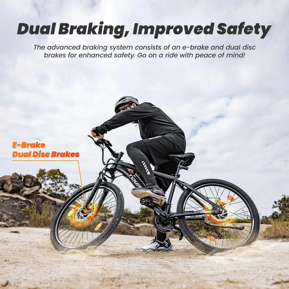 Person riding an electric bike with dual braking system on a dirt path.