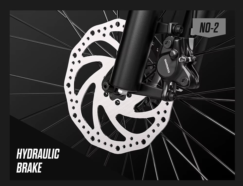Close-up of a bicycle hydraulic brake system.
