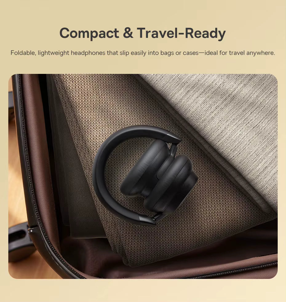  Folded Baseus Bowie MH1 headphones placed neatly inside an open suitcase on top of folded beige and brown fabric, with the heading “Compact & Travel‑Ready,” highlighting the foldable lightweight design ideal for travel and easy storage.