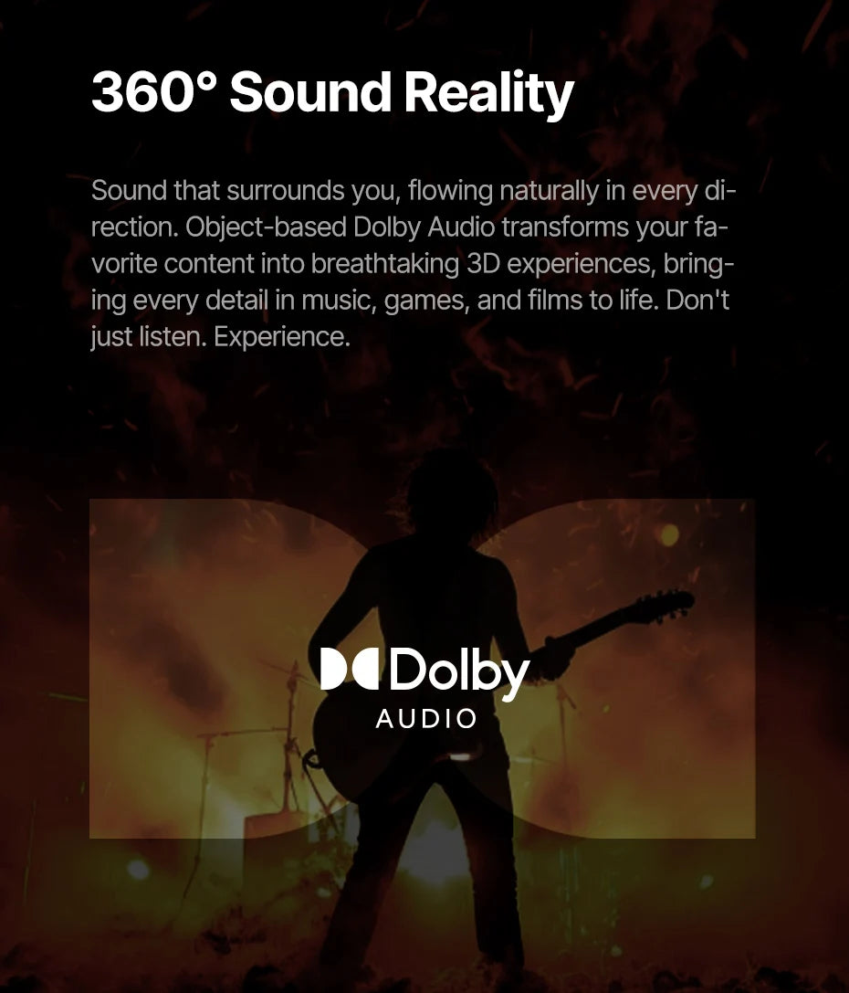 Dolby Audio advertisement with a silhouette of a person playing guitar against a sunset background.
