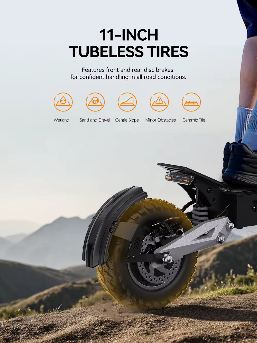 Electric scooter with 11-inch tubeless tires on a mountainous landscape