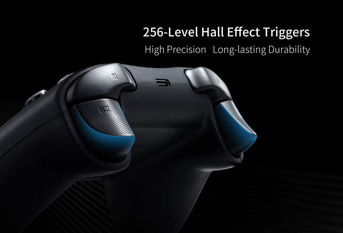 GuliKit ES Pro Controller rear‑trigger close‑up showing 256‑level Hall Effect triggers with blue accents. Promotional graphic text reads “256‑Level Hall Effect Triggers – High Precision, Long‑lasting Durability,” highlighting advanced sensor technology for smooth, accurate input.