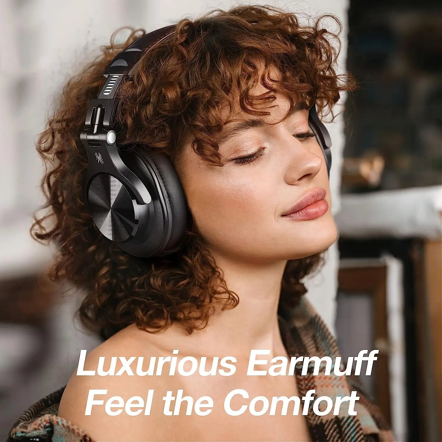 Woman wearing black headphones with text 'Luxurious Earmuff Feel the Comfort' on a blurred background