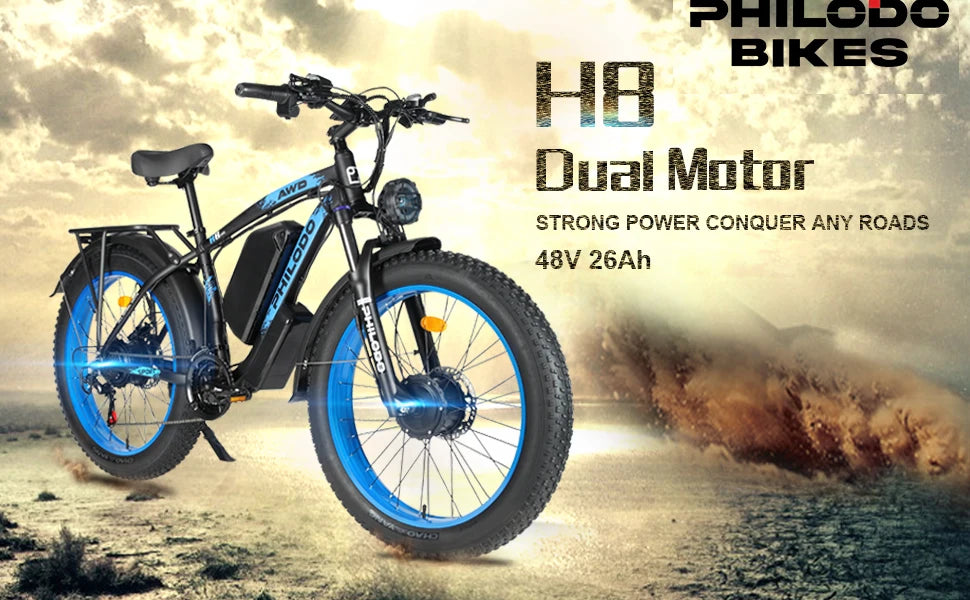 Electric bike with dual motor on a desert background, featuring Philodo Bikes branding.