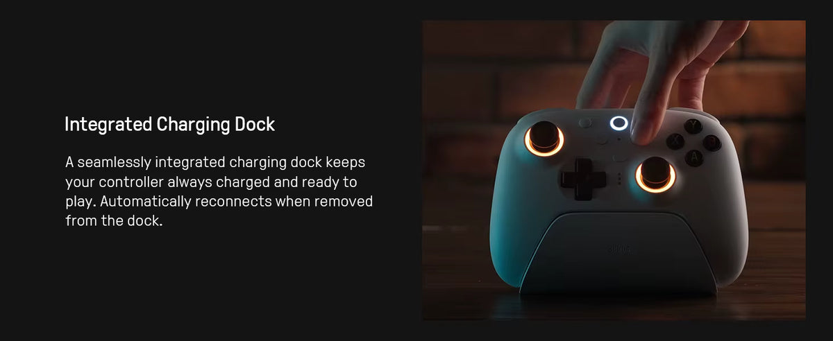 8BitDo promotional banner highlighting the Integrated Charging Dock, showing a white wireless controller resting on its charging stand with warm glowing amber fire ring LEDs while a hand interacts with the power button.