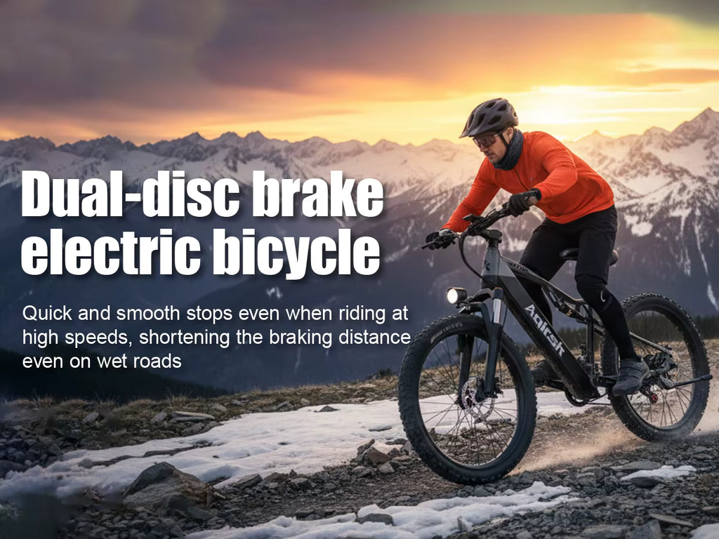 Person riding a dual-disc brake electric bicycle with mountains in the background