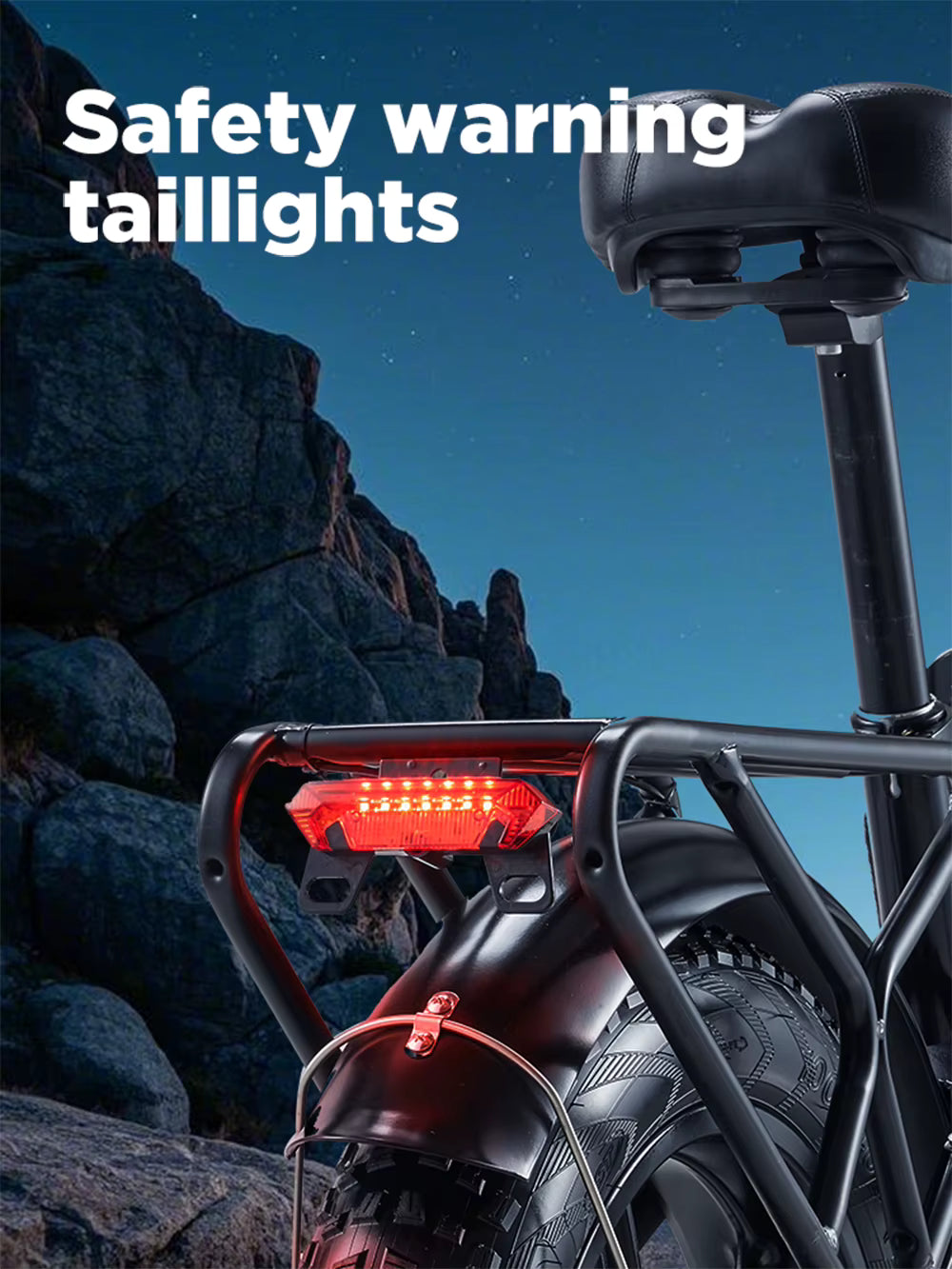 Electric Bicycle tail light on a mountain bike with safety warning text against a rocky background.