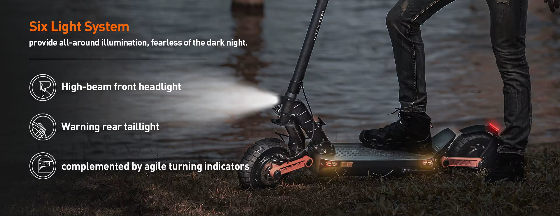 Electric scooter with lighting system features on a dark background