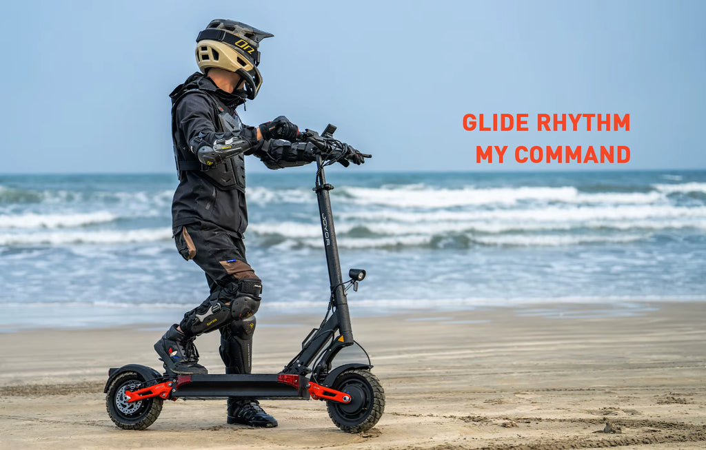 Person on a beach with an electric scooter, wearing protective gear, with text 'Glide Rhythm My Command' in the background.