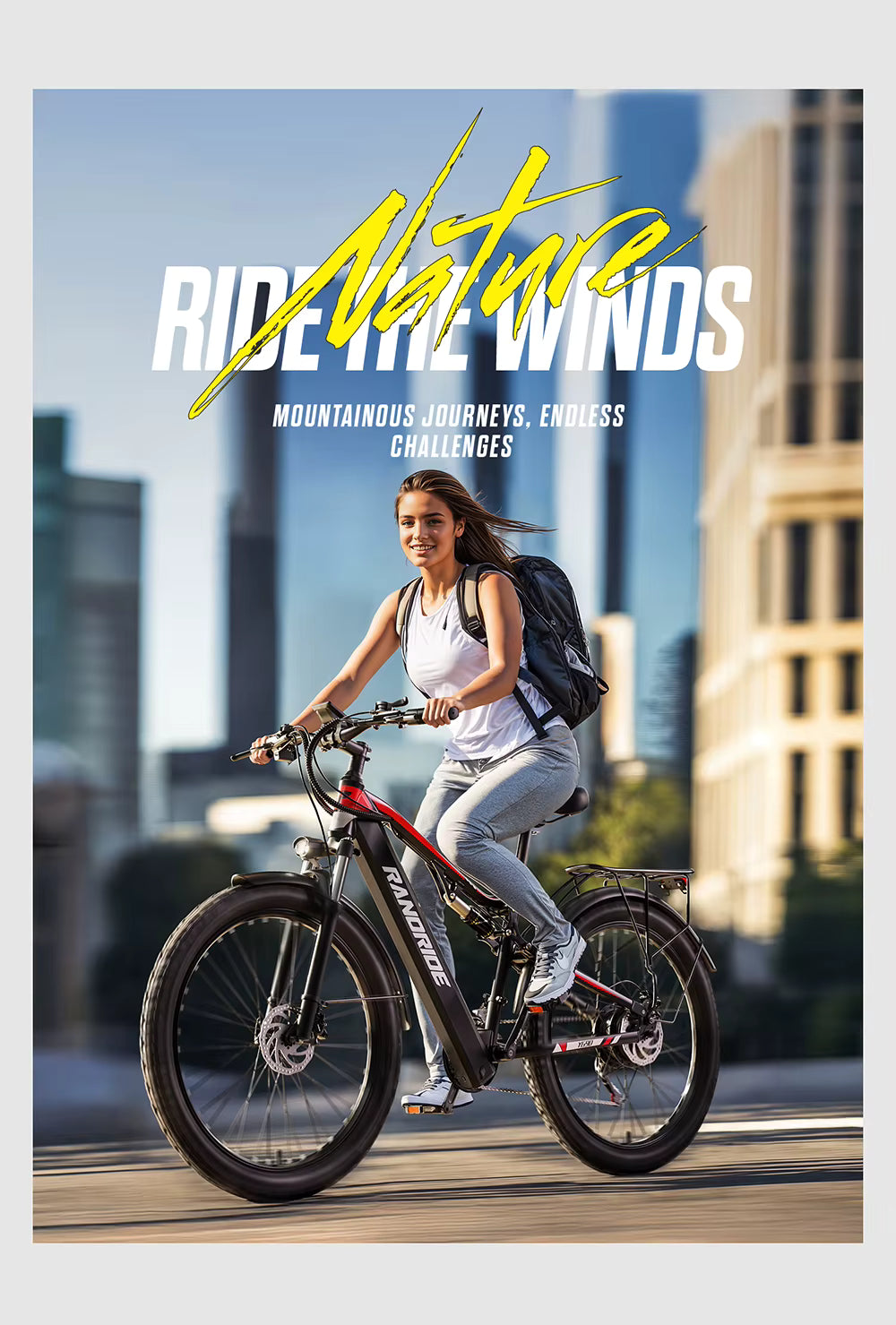 Woman riding a bicycle with 'Ride the Winds' text in an urban setting