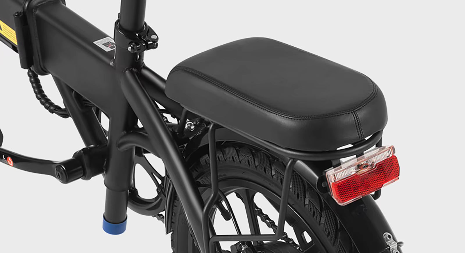 Black DYU A1F Pro Folding E-Bike electric bike with a seat and rear light on a white background