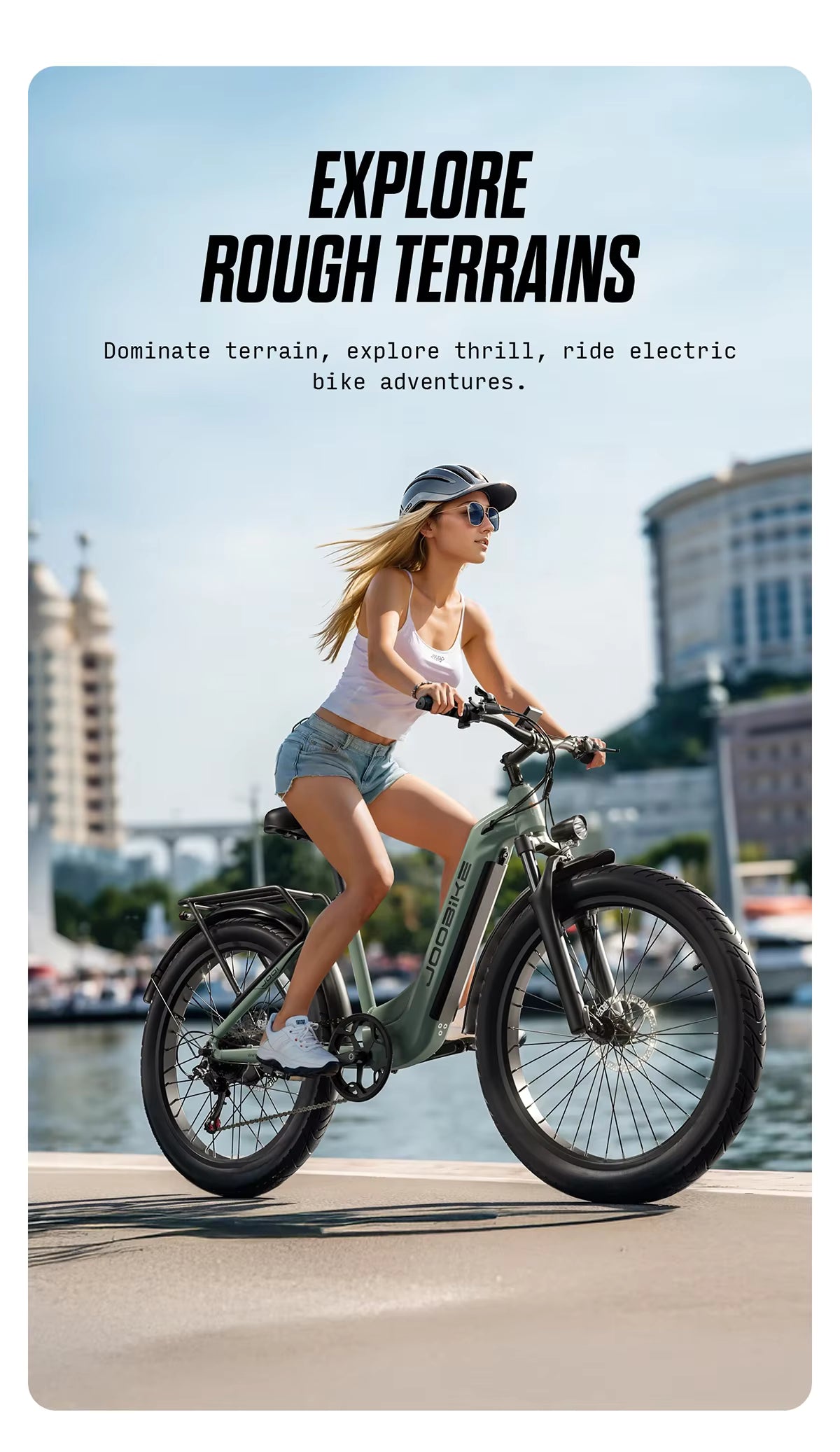 Woman riding a JOOBIKE JOO1 electric bike with text promoting exploring rough terrains.