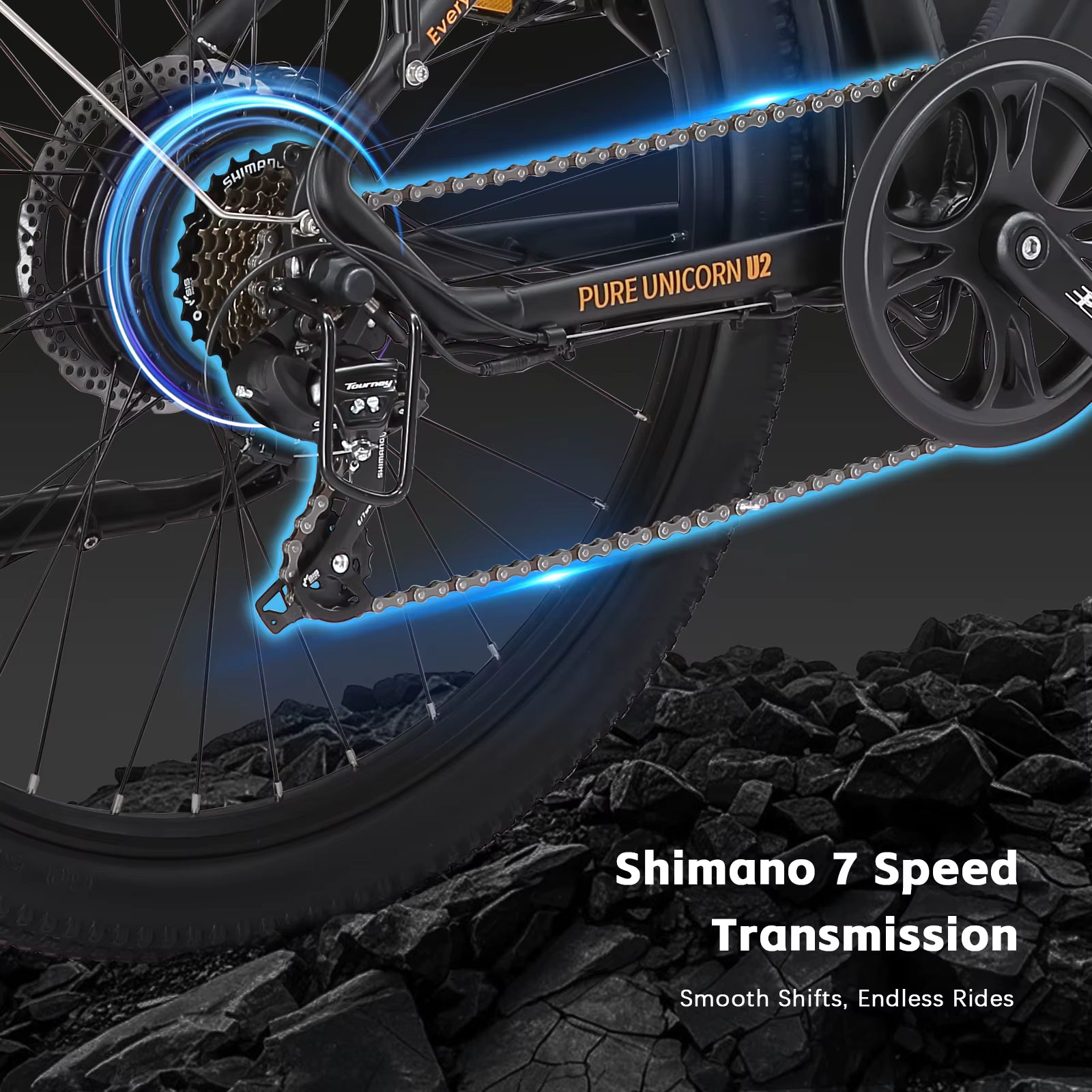 Close-up of a PURE UNICORN U2 electric bicycle chain and gear system with 'Pure Unicorn V2' branding on a dark background.