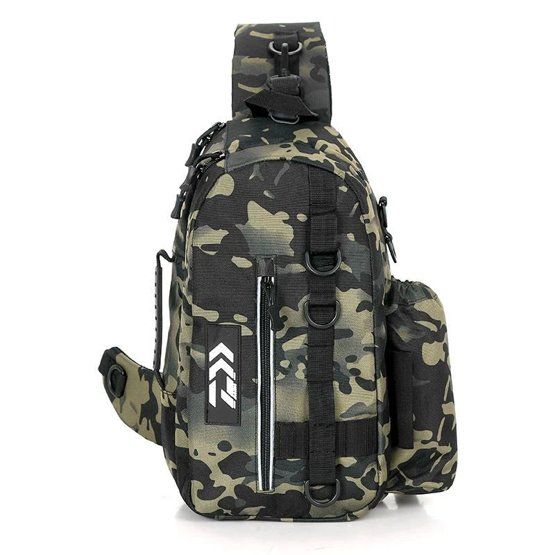 A fishing tackle sling backpack in a green and black camouflage pattern, featuring a front zippered pocket with a white logo, side pockets, and a padded shoulder strap, shown against a plain white background.