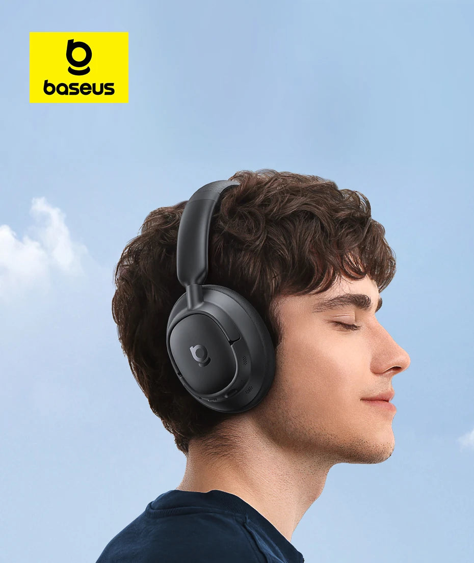 Person wearing black headphones with a clear blue sky background and Baseus logo.