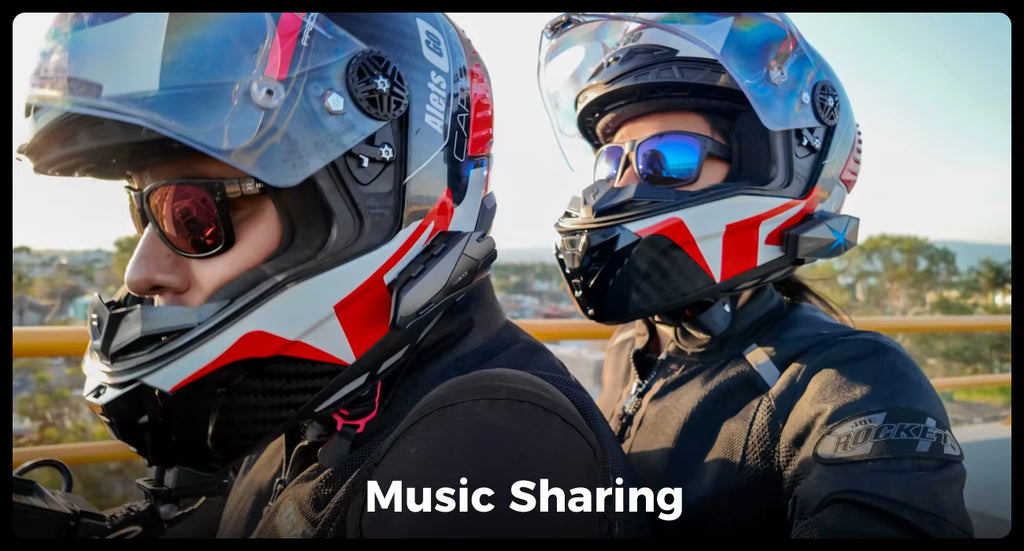 Two people wearing full-face motorcycle helmets and sunglasses, shown in a close-up outdoor shot with the text 'Music Sharing' overlaid at the bottom.