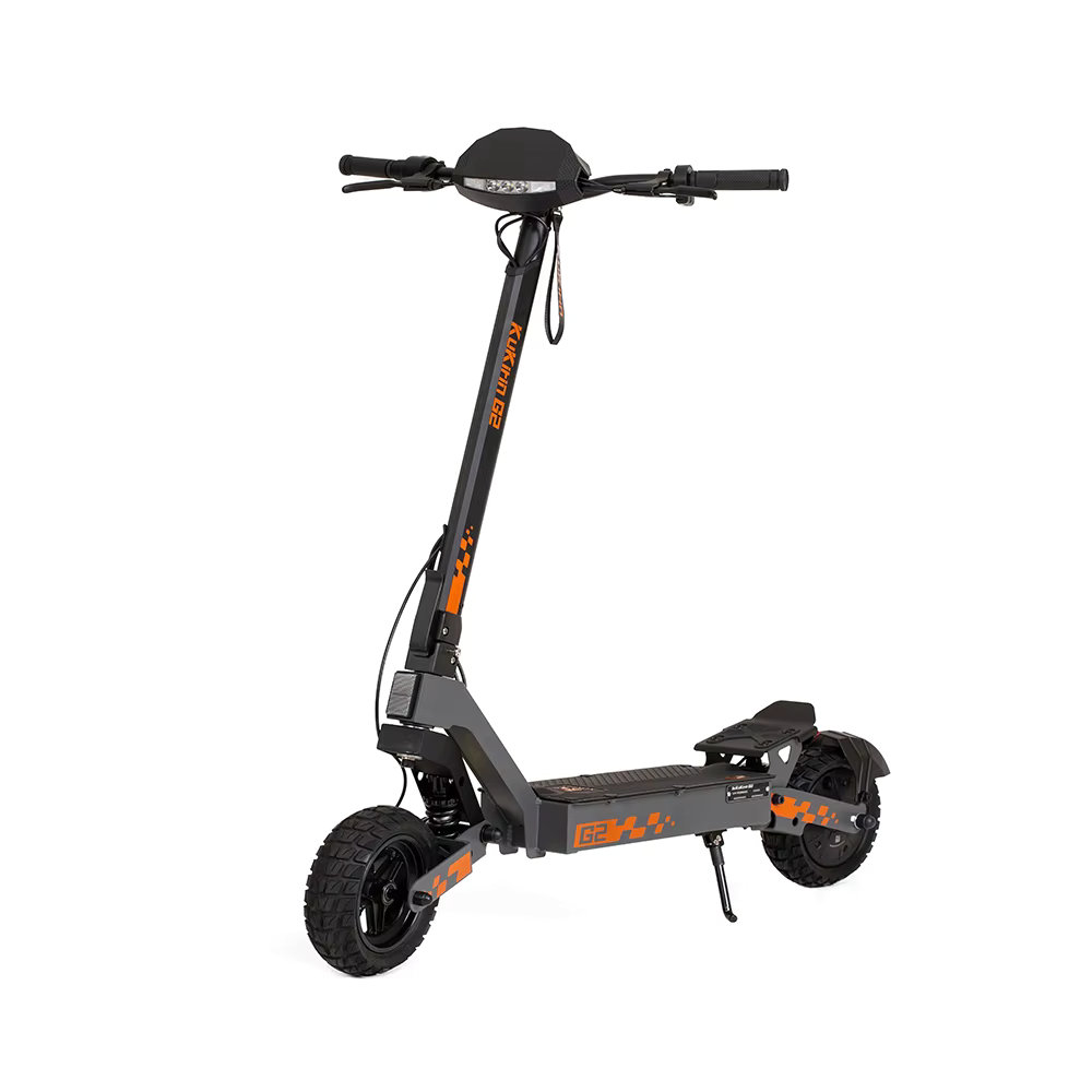 Black electric scooter with orange branding on a white background