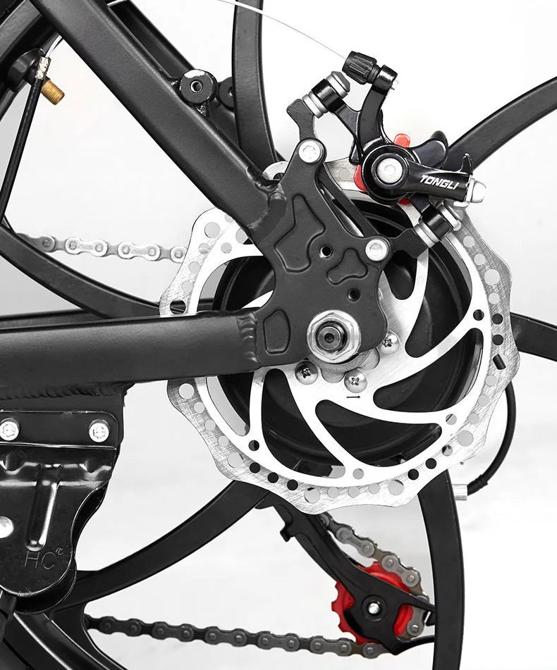 Close-up of an AVAKA BZ20 PLUS Foldable E‑bike bicycle disc brake system with a white background