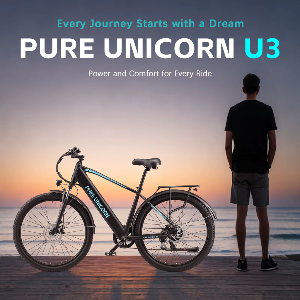PURE UNICORN U3 electric bike on a beach with a person looking at the sunset.