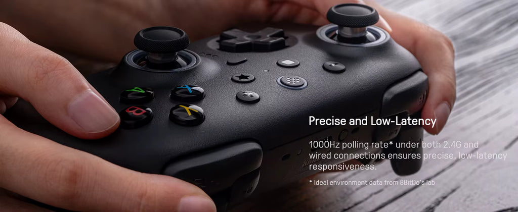 8BitDo promotional graphic showing a black wireless controller being held, emphasizing 'Precise and Low-Latency' performance. The text highlights a 1000Hz polling rate* under both 2.4G wireless and wired connections, ensuring unrivaled responsiveness for competitive gaming.