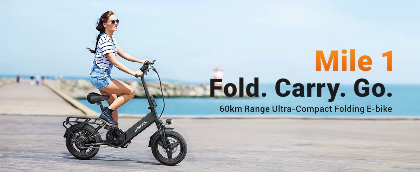 Woman riding a HillMiles Mile 1 compact folding electric bike with scenic background with Mile 1 txt Fold. Carry. Go. txt in the image and information on the e-bikes range