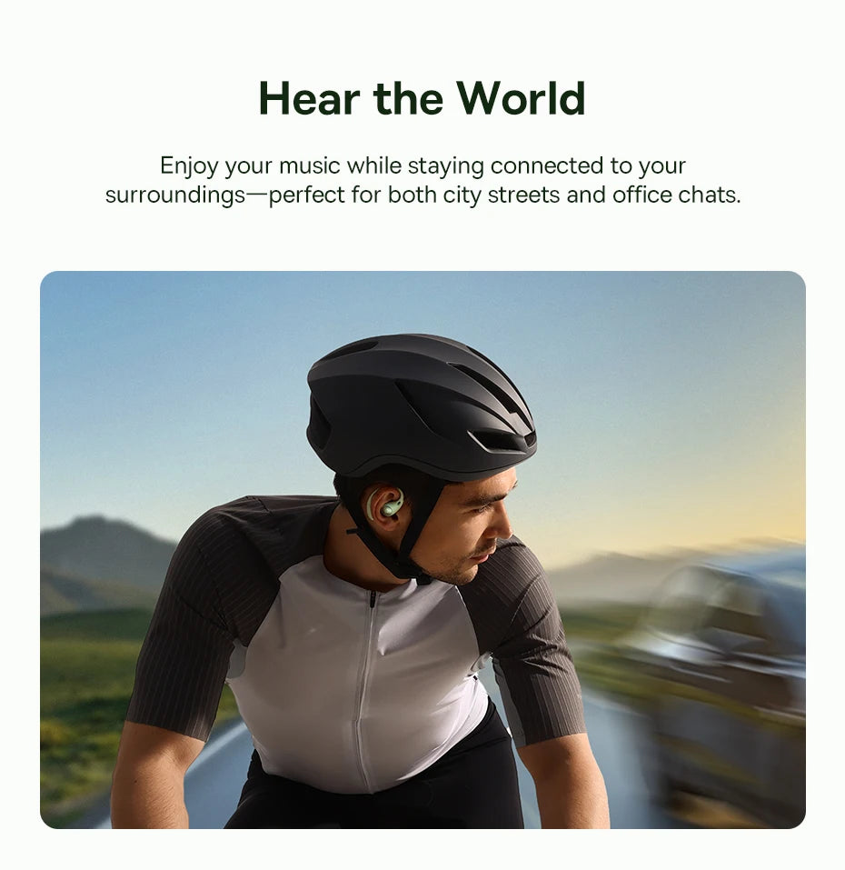 Person wearing a helmet and wireless earbuds with scenic background