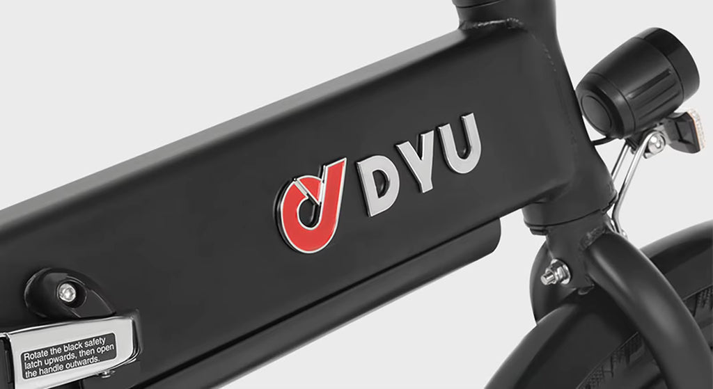 Close-up of a black DYU A1F Pro Folding E-Bike electric bicycle frame with 'DYU' branding on a gray background