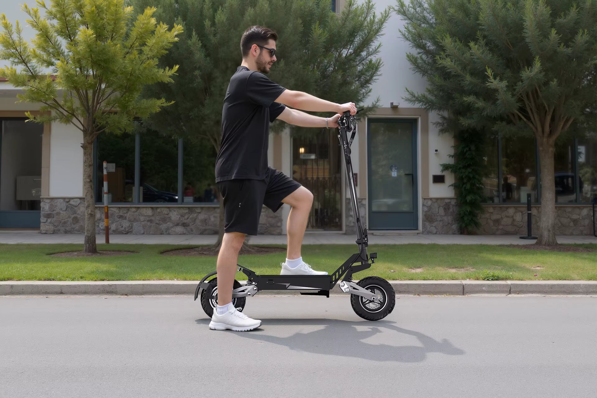 Person riding an electric scooter on a street with buildings and trees in the background
