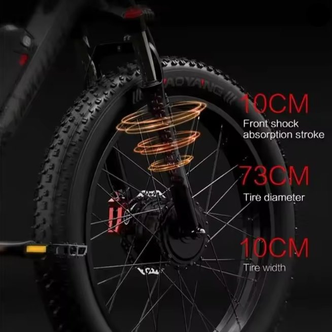 Close‑up of LANKELEISI MG740PLUS front wheel and suspension showing 10cm shock absorption stroke, 73cm tyre diameter and 10cm tyre width with glowing orange coil highlights on dark background.