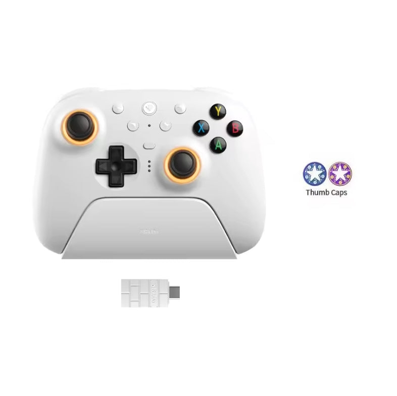 8BitDo Ultimate 2 Wireless Controller in white docked on its magnetic charging stand, featuring RGB lighting fire rings around the TMR joysticks, action buttons, 2.4GHz wireless USB adapter, and included thumb caps.