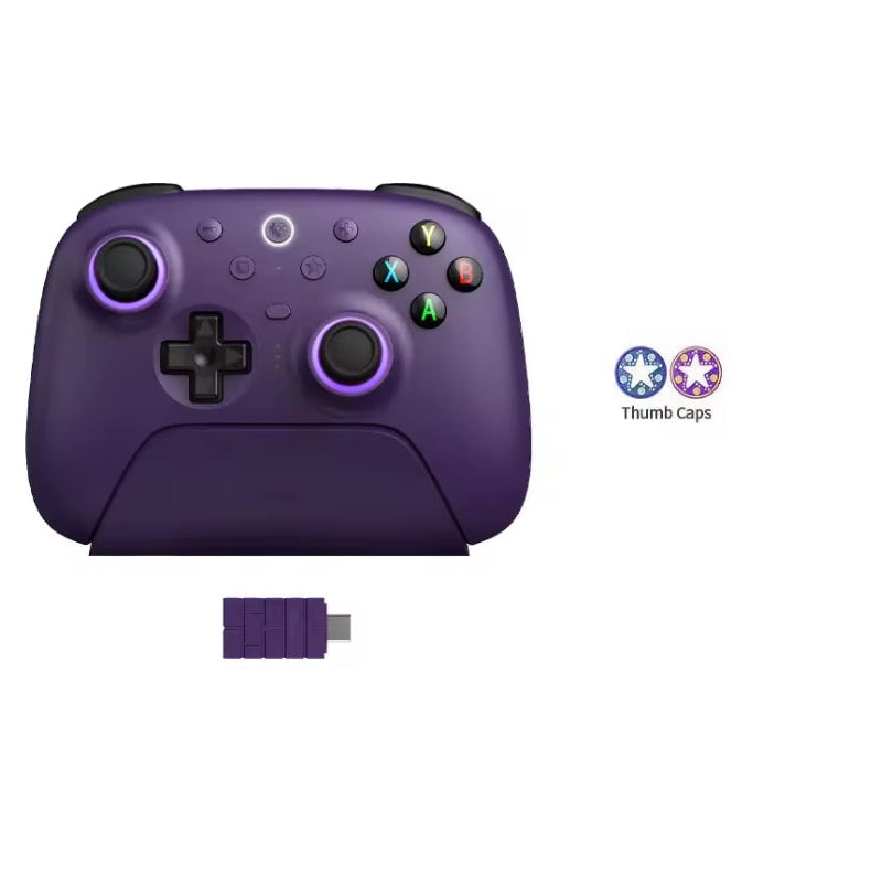 8BitDo Ultimate 2 Wireless Controller in purple docked on its magnetic charging stand, featuring RGB lighting fire rings around the TMR joysticks, action buttons, 2.4GHz wireless USB adapter, and included thumb caps.