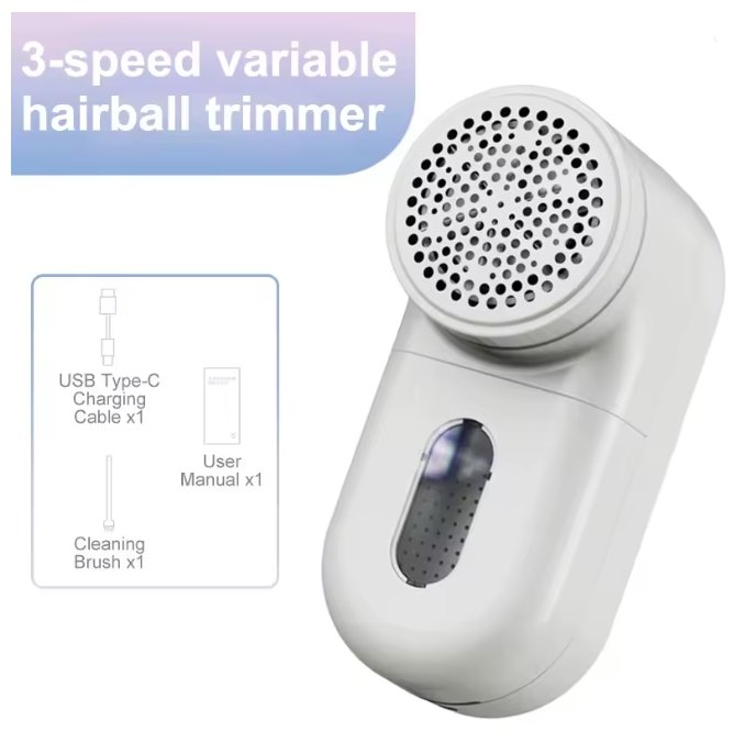 A white 3-speed variable hairball trimmer shown on a light gray background, with a blue label at the top reading '3-speed variable hairball trimmer' and a small inset showing included accessories: a USB Type-C charging cable, user manual, and cleaning brush.