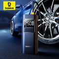 A Baseus portable car tire inflator standing upright in front of a blue car and large alloy wheel, with its charging hose connected. The device has a digital display and the Baseus logo near the bottom.