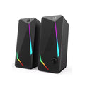 A pair of black rectangular computer speakers with RGB rainbow LED light accents, shown on a clean white background.