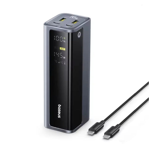 A black and dark gray Baseus portable power bank with a digital display showing 100% battery and 145W power, accompanied by a black USB-C to USB-C cable on a white background.