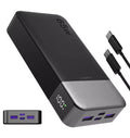A 65W portable power bank in black and gray, shown with a USB-C cable and a small inset diagram of its ports, on a white background.