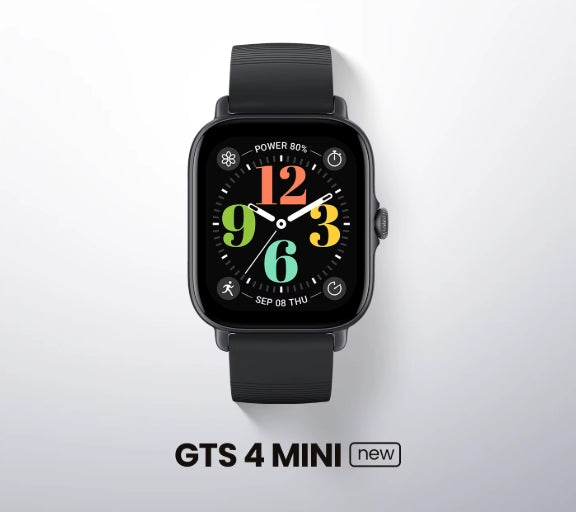 Black smartwatch with a rectangular rounded-square face and black strap, shown on a light gray background with the text 'GTS 4 MINI new' below.