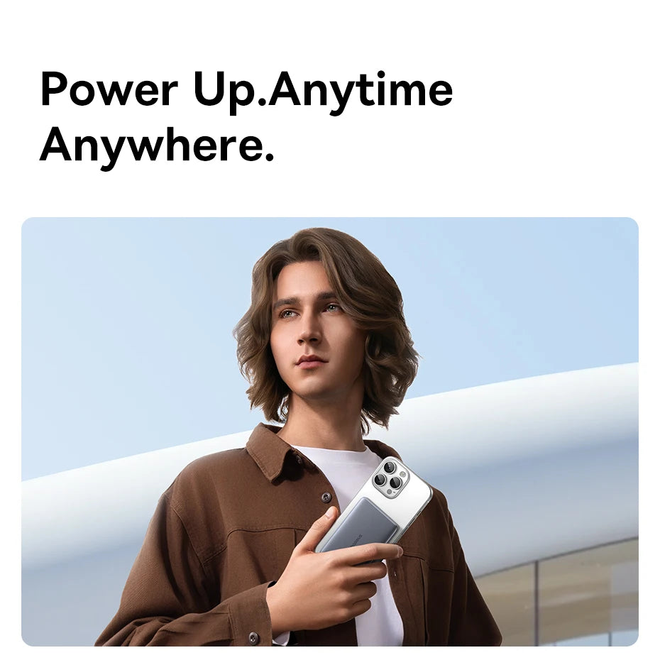Baseus Thin Magnetic Wireless Power Bank 20W 5000mAh held seamlessly against an iPhone in portable lifestyle use.
