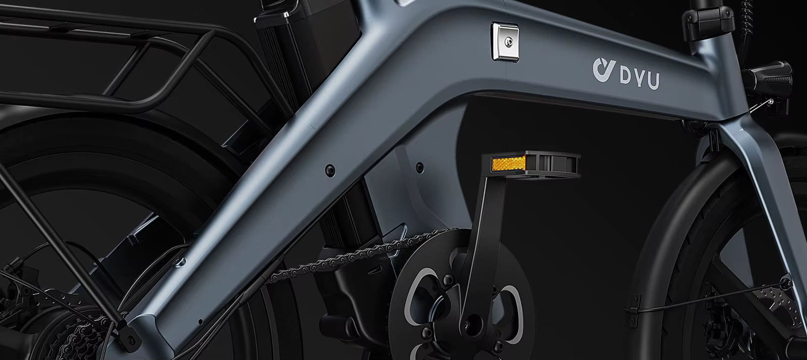 Close-up of a bicycle with DYU branding on a dark background