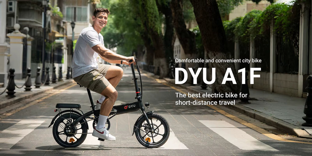 Person riding a DYU A1F electric bike on a city street