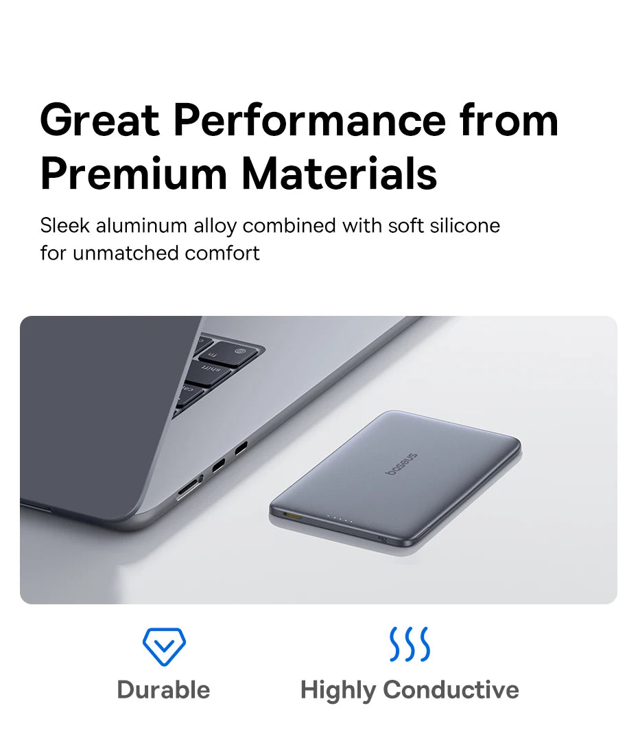 Laptop and magnetic power bank with text about premium materials and features on a white background