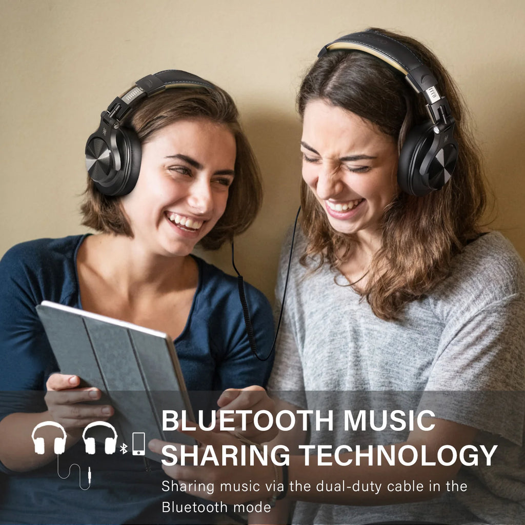 Two people wearing headphones looking at a tablet with text about Bluetooth music sharing technology.